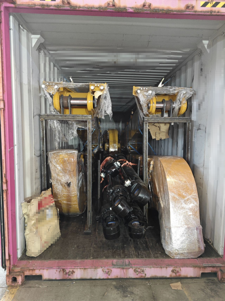 Loaded Mini Excavator Arms Into A 45Hq Container2